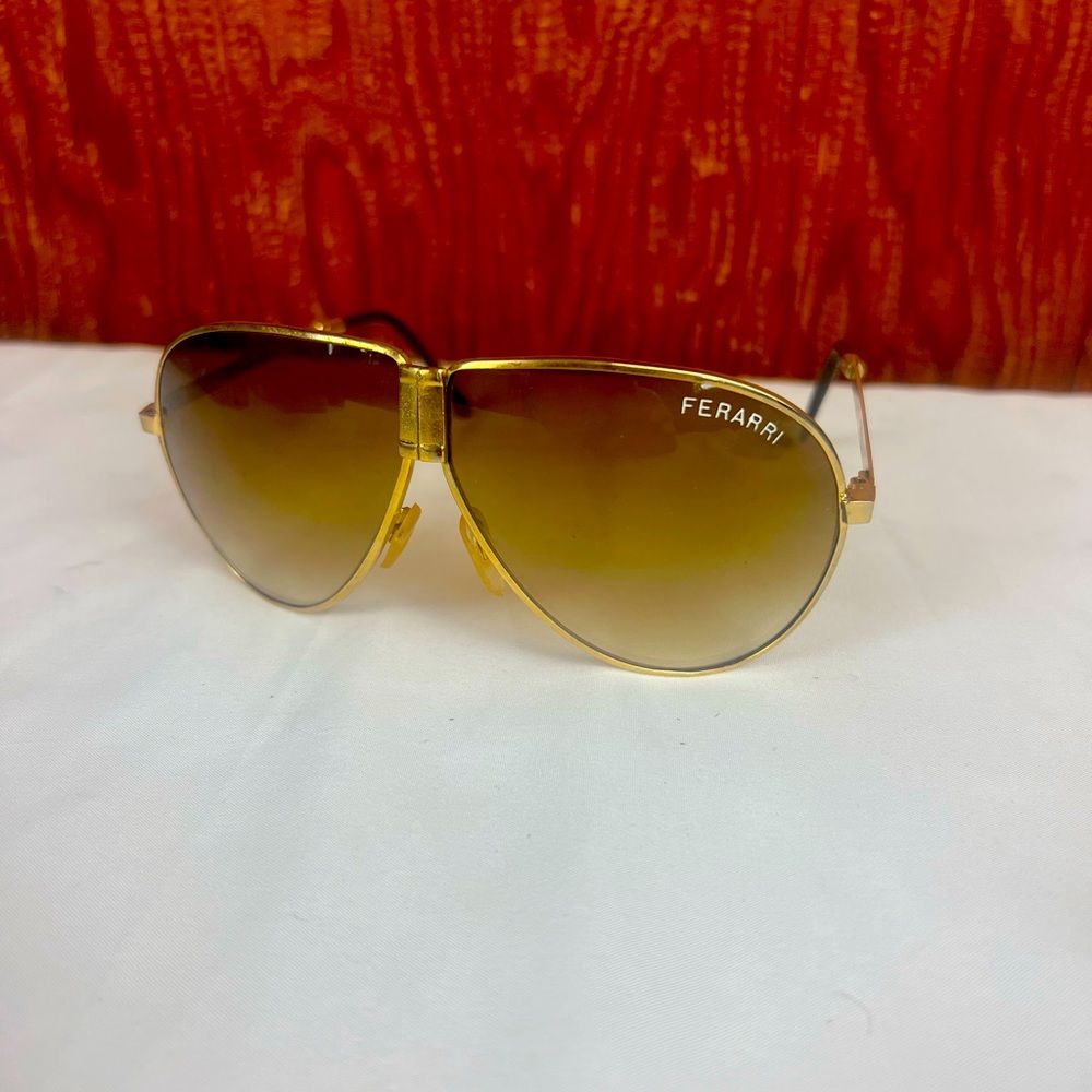 Ferarri Sunglasses Antique Brown case with gold frame